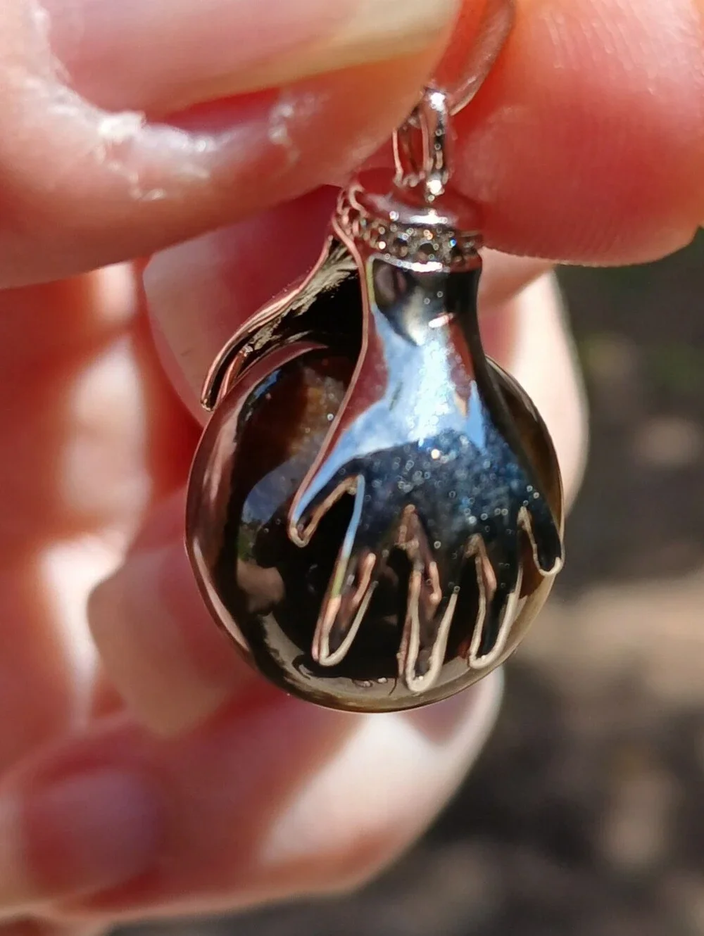 New 18K Hands Holding Tiger Eye Sphere Pendant.